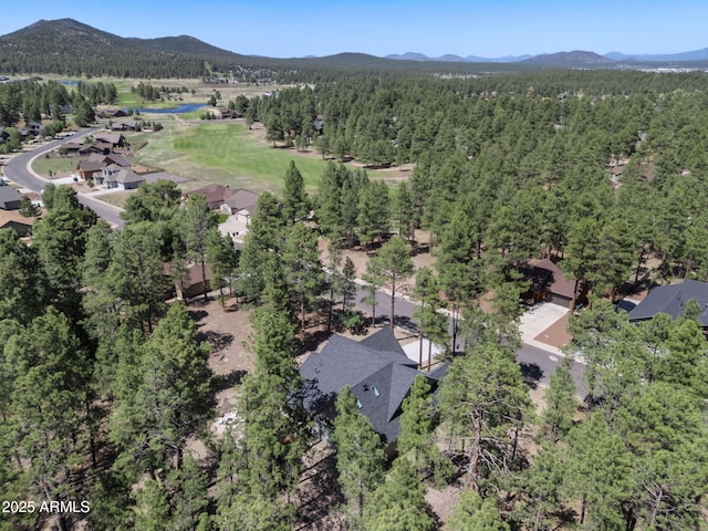 956 S Torrey Pines Dr, Williams, AZ 86046 - aerial view of property and surrounding area with a mountain backdrop and a heavily wooded area