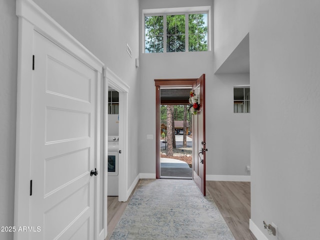 956 S Torrey Pines Dr, Williams, AZ 86046 - entryway with light wood-type flooring, healthy amount of natural light, and a high ceiling