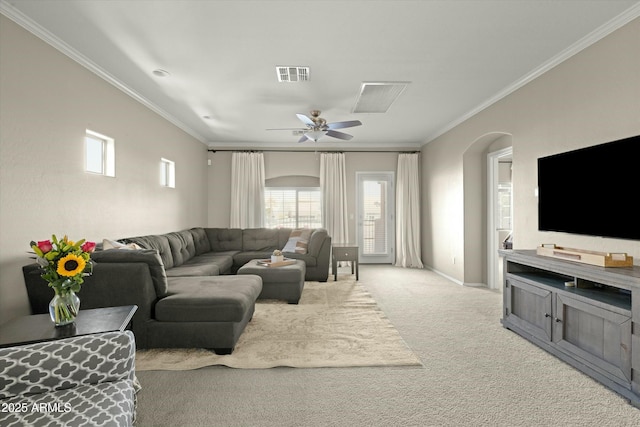 living room with light carpet, ceiling fan, and crown molding