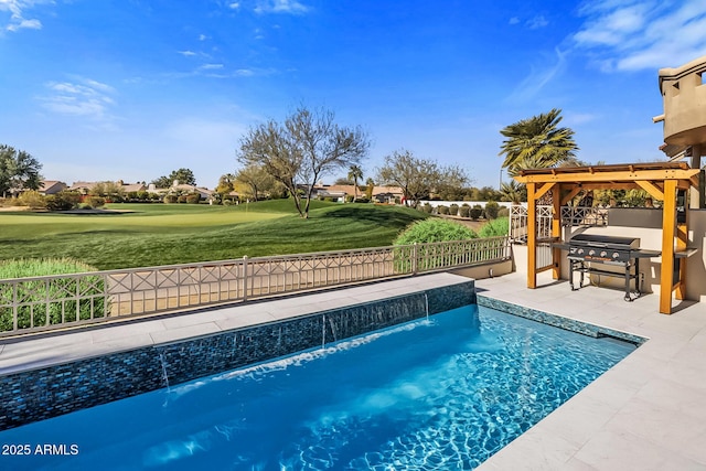 view of swimming pool with a patio, a grill, a lawn, and pool water feature