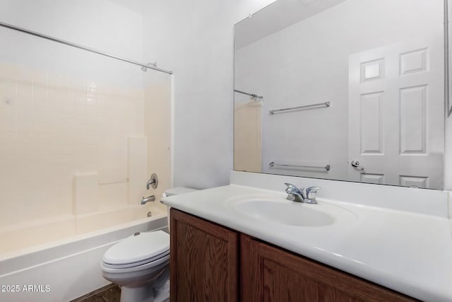 full bathroom with shower / tub combination, vanity, and toilet