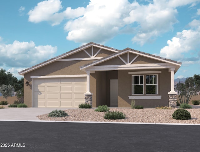 view of front of home with stucco siding, concrete driveway, and a garage