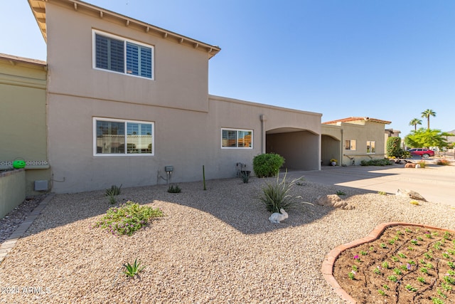 view of home's exterior with a patio area