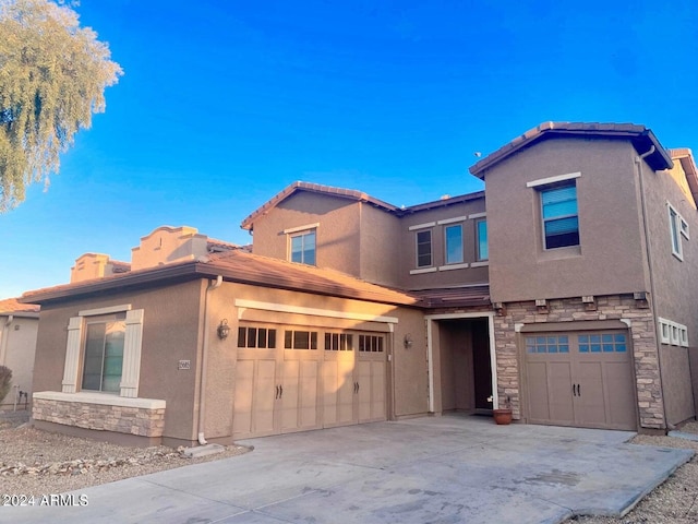 view of front of property featuring a garage