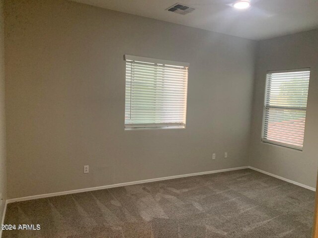 empty room with carpet floors