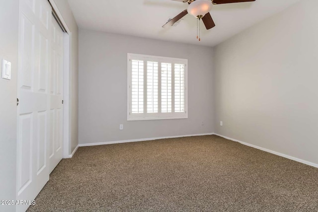 23162 W Lasso Ln, Buckeye, AZ 85326 - unfurnished bedroom with carpet flooring, a closet, baseboards, and a ceiling fan