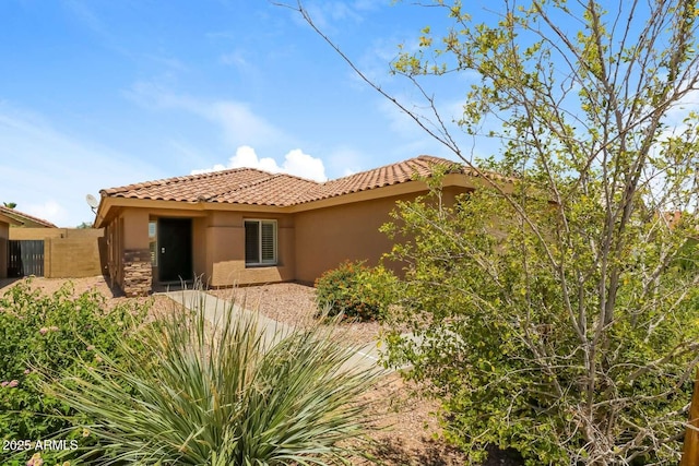23162 W Lasso Ln, Buckeye, AZ 85326 - back of house featuring stucco siding and a tile roof
