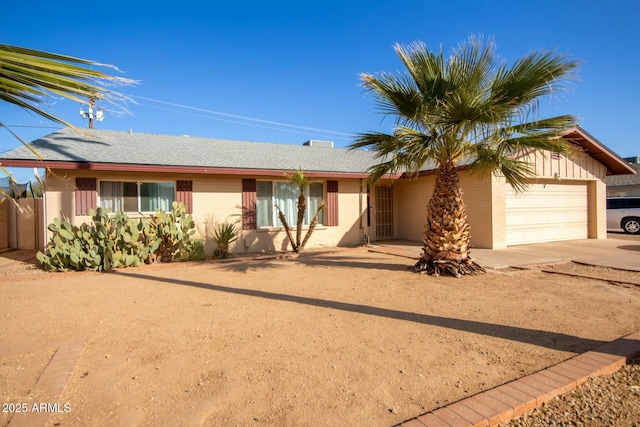 single story home with a garage