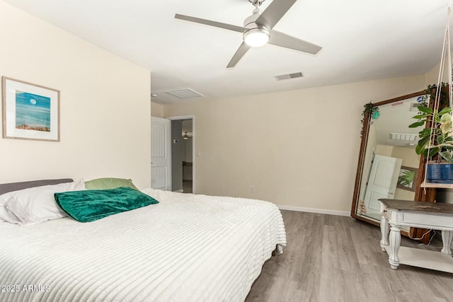 bedroom with light hardwood / wood-style floors and ceiling fan