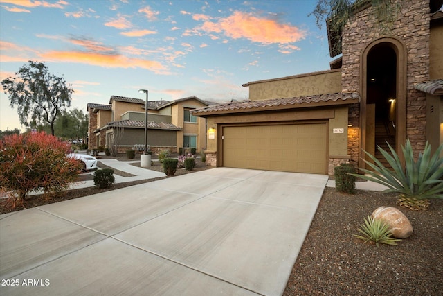 view of front of property featuring a garage