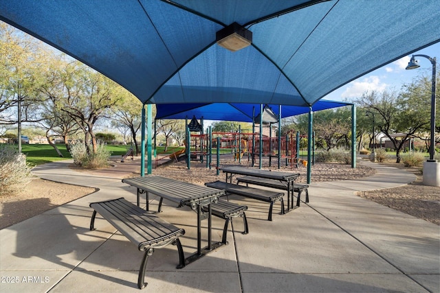 view of property's community with a playground