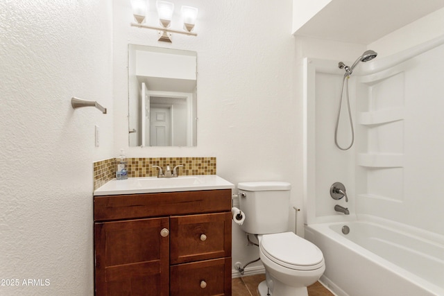 full bathroom featuring tasteful backsplash, vanity, toilet, and shower / bath combination