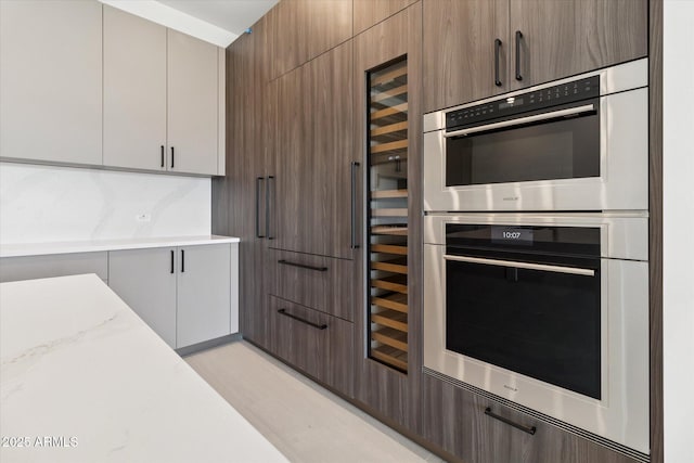 19355 N 73rd Way Unit E-4014, Scottsdale, AZ 85255 - kitchen with double oven and modern cabinets