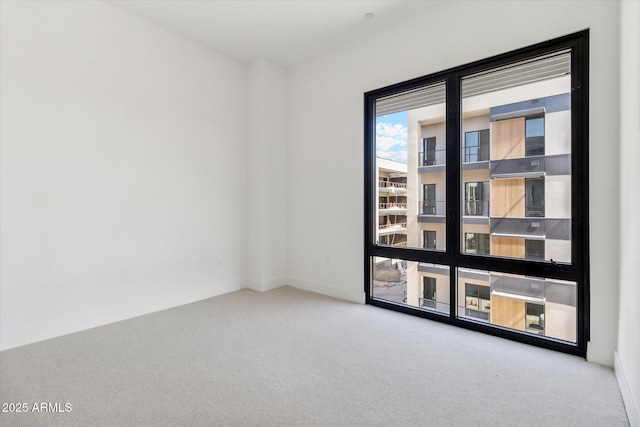 19355 N 73rd Way Unit E-4014, Scottsdale, AZ 85255 - empty room with carpet and baseboards