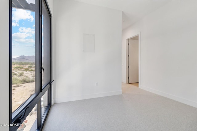 19355 N 73rd Way Unit E-4014, Scottsdale, AZ 85255 - spare room featuring plenty of natural light, a mountain view, and carpet flooring