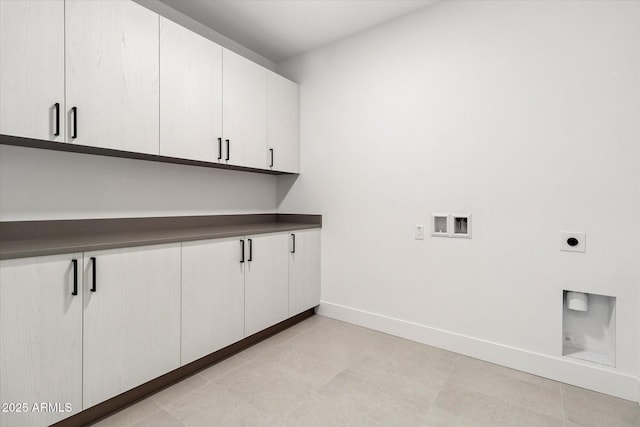 19355 N 73rd Way Unit E-4014, Scottsdale, AZ 85255 - washroom with cabinet space, hookup for an electric dryer, hookup for a washing machine, and light tile patterned floors
