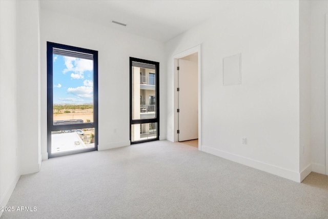 19355 N 73rd Way Unit E-4014, Scottsdale, AZ 85255 - carpeted empty room featuring baseboards