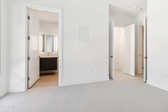 19355 N 73rd Way Unit E-4014, Scottsdale, AZ 85255 - unfurnished bedroom with light carpet and ensuite bathroom