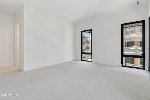 19355 N 73rd Way Unit E-4014, Scottsdale, AZ 85255 - unfurnished room featuring plenty of natural light and carpet floors