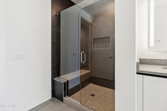 19355 N 73rd Way Unit E-4014, Scottsdale, AZ 85255 - bathroom featuring a stall shower, vanity, and tile patterned flooring