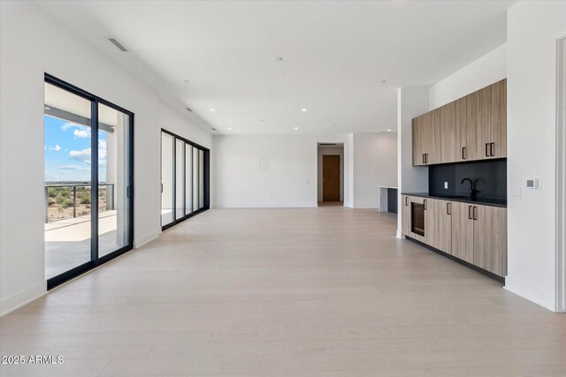 19355 N 73rd Way Unit E-4014, Scottsdale, AZ 85255 - spare room featuring light wood finished floors and recessed lighting