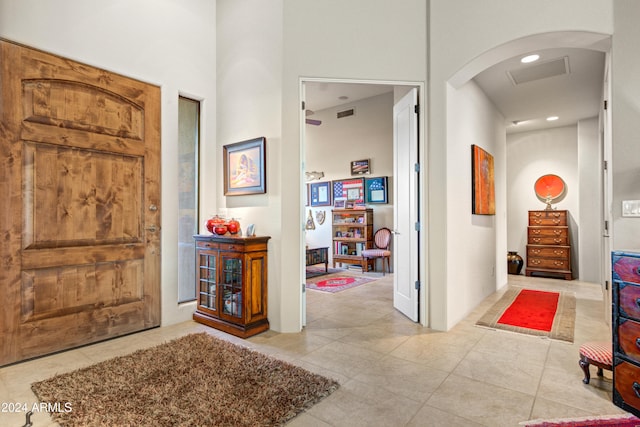 entryway featuring light tile patterned floors