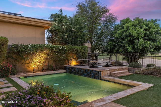 6929 E Montreal Pl, Scottsdale, AZ 85254 - pool at dusk with a fenced backyard