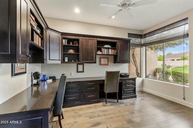6929 E Montreal Pl, Scottsdale, AZ 85254 - office area featuring ceiling fan, light wood-style flooring, recessed lighting, built in desk, and baseboards