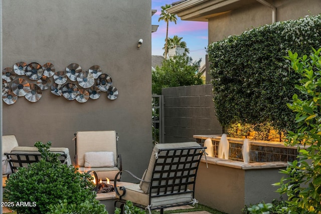 6929 E Montreal Pl, Scottsdale, AZ 85254 - patio terrace at dusk with fence