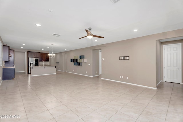 10160 E Harvest Rd, Florence, AZ 85132 - unfurnished living room with ceiling fan, baseboards, and recessed lighting