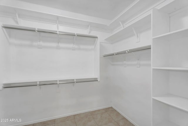 10160 E Harvest Rd, Florence, AZ 85132 - walk in closet featuring light tile patterned floors