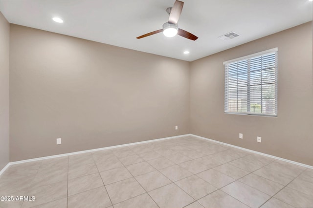10160 E Harvest Rd, Florence, AZ 85132 - unfurnished room with a ceiling fan, baseboards, recessed lighting, and light tile patterned floors