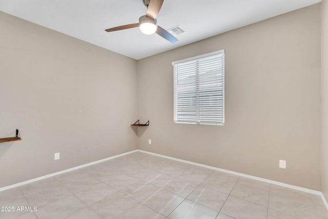 10160 E Harvest Rd, Florence, AZ 85132 - spare room with a ceiling fan, baseboards, and light tile patterned floors