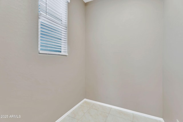 10160 E Harvest Rd, Florence, AZ 85132 - unfurnished room with baseboards and light tile patterned flooring