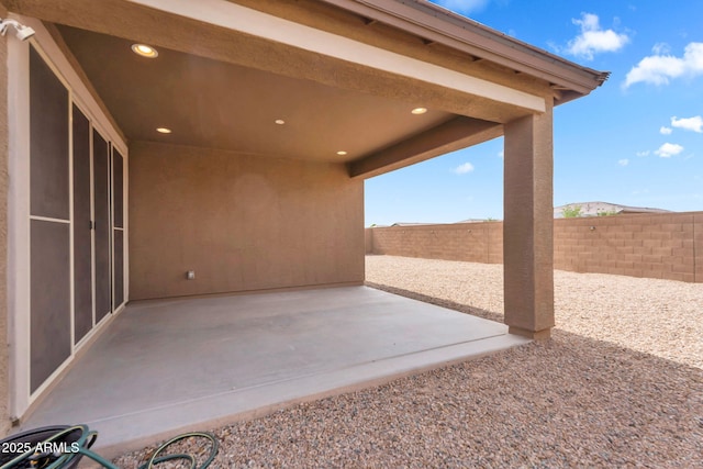 10160 E Harvest Rd, Florence, AZ 85132 - fenced backyard with a patio