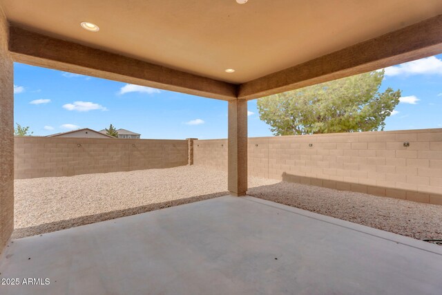 10160 E Harvest Rd, Florence, AZ 85132 - fenced backyard with a patio