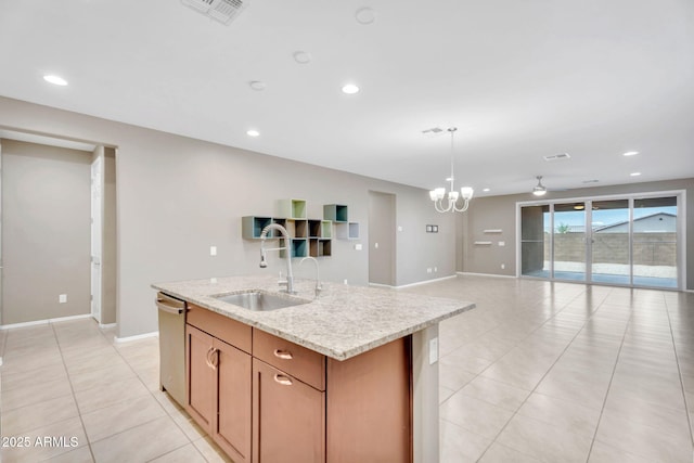 10160 E Harvest Rd, Florence, AZ 85132 - kitchen with a sink, stainless steel dishwasher, open floor plan, light tile patterned floors, and recessed lighting