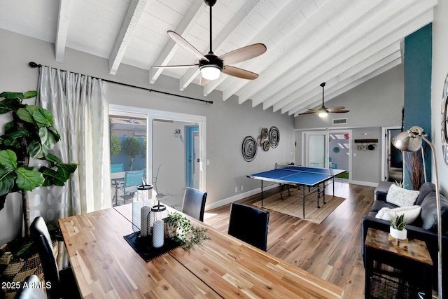 playroom with high vaulted ceiling, wood finished floors, visible vents, baseboards, and beamed ceiling