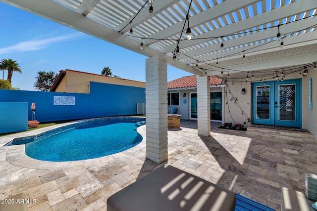 view of pool with a fenced in pool, a fenced backyard, french doors, a patio area, and a pergola