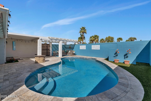 view of pool with a pergola and a patio