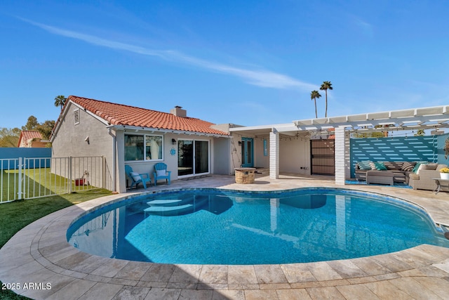 view of pool with a patio area, fence, a fenced in pool, and a pergola