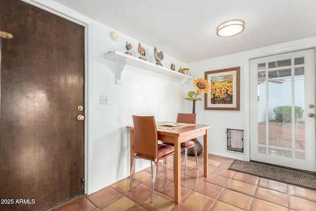 view of tiled dining space