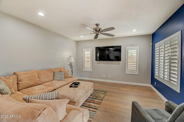 10249 E Kinetic Dr, Mesa, AZ 85212 - living area featuring ceiling fan, wood finished floors, baseboards, and recessed lighting