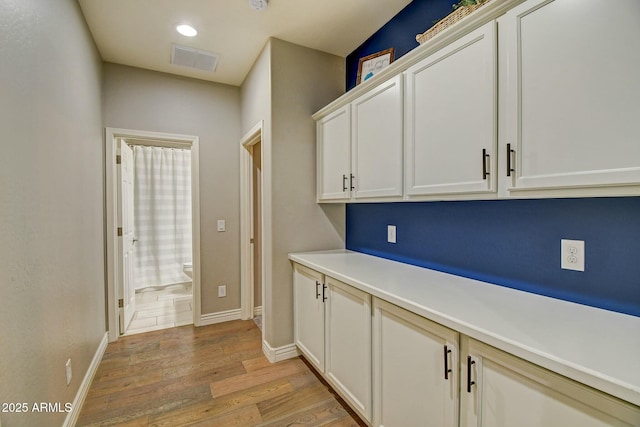 10249 E Kinetic Dr, Mesa, AZ 85212 - corridor with light wood-type flooring, baseboards, and recessed lighting
