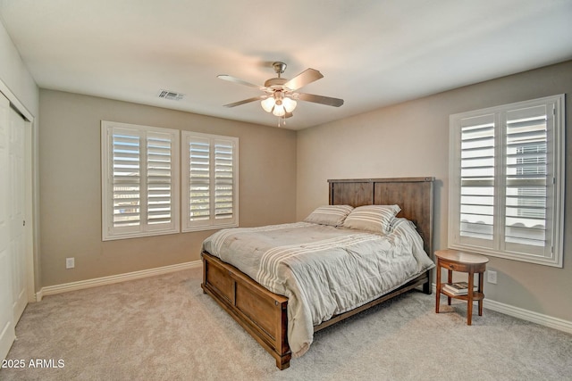10249 E Kinetic Dr, Mesa, AZ 85212 - carpeted bedroom featuring baseboards, a closet, and ceiling fan