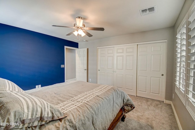 10249 E Kinetic Dr, Mesa, AZ 85212 - bedroom featuring carpet flooring, a closet, ceiling fan, and baseboards