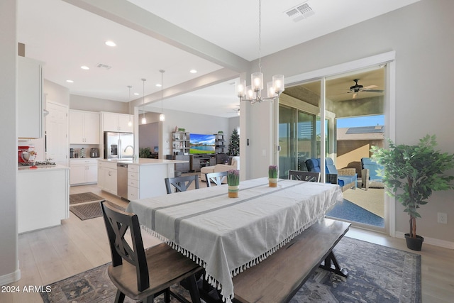 dining room featuring recessed lighting, visible vents, ceiling fan with notable chandelier, and light wood-type flooring