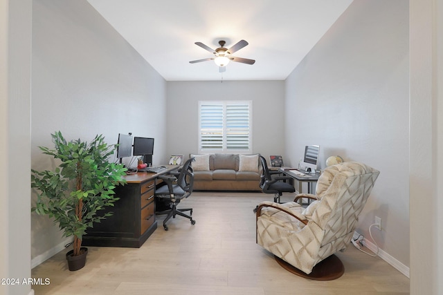 office with light wood-type flooring, baseboards, and ceiling fan