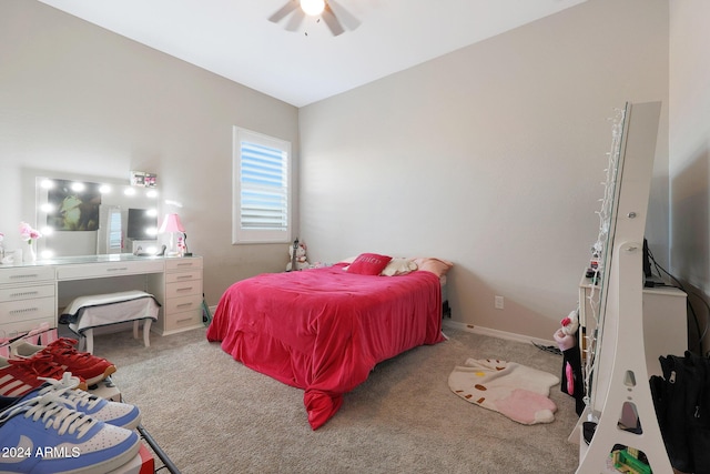 carpeted bedroom with a ceiling fan