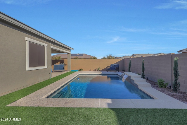 view of swimming pool featuring a fenced backyard, a fenced in pool, and a patio